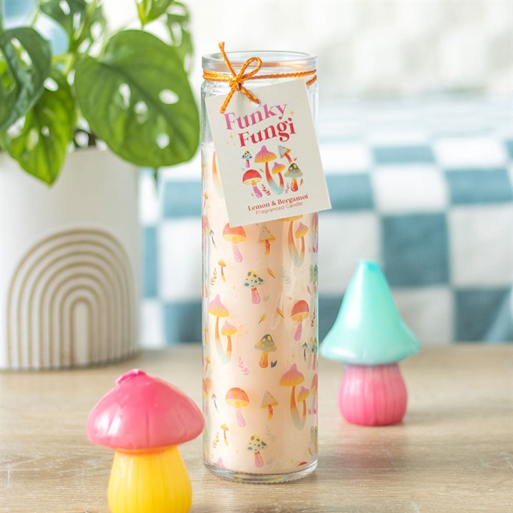 Bring the magic of the forest indoors with this "Funky Fungi" candle set! Featuring a tall, mushroom-patterned jar candle and adorable mini mushroom candles, itÕs perfect for creating a cozy, whimsical atmosphere. Great as a gift or for adding a touch of cottagecore charm to your space, these candles are as delightful as they are decorative!