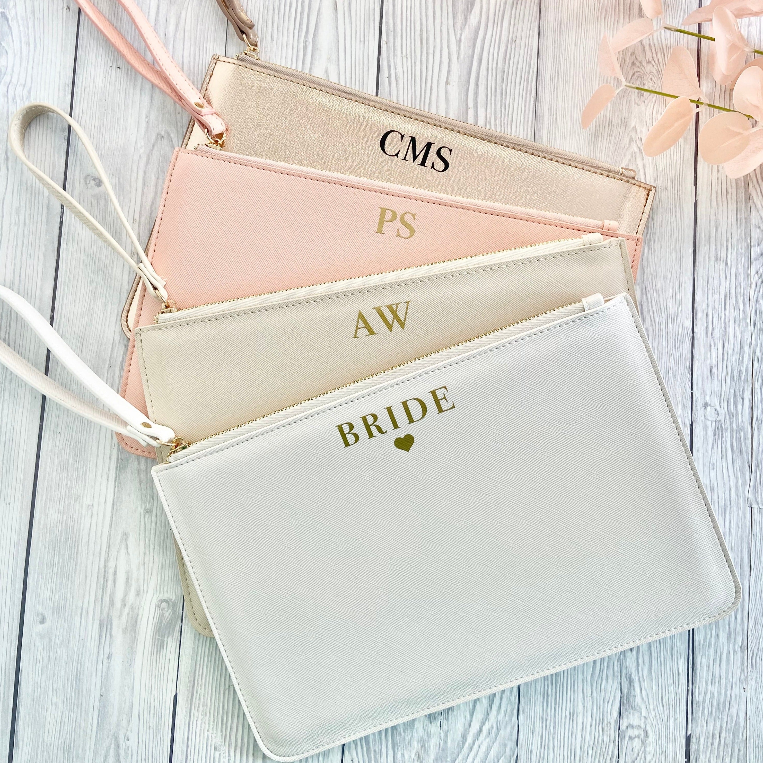 Engraved clearance clutch bag